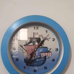 wall clock featuring a pirate ship design