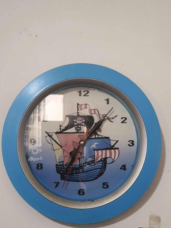 wall clock featuring a pirate ship design