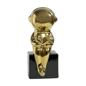 Gold astronaut statue