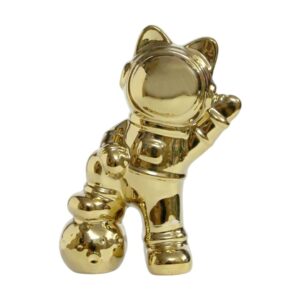 Gold astronaut statue with moon