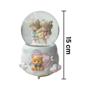 Couple And Small Animal. Snow Globe (music and lights)