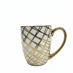 gold and white mug