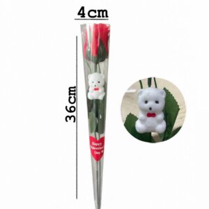 Artificial single red rose with a small teddy bear